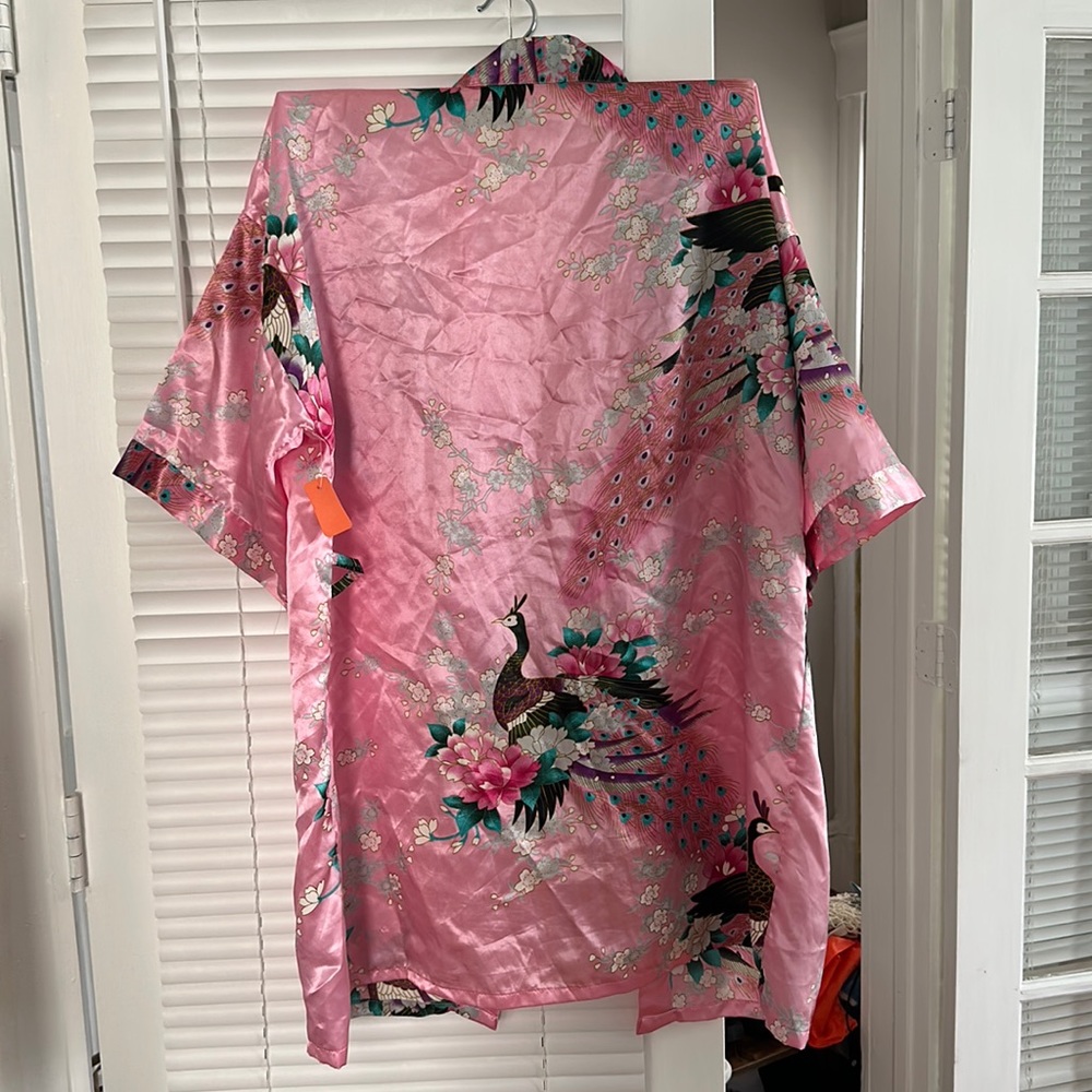 Pink kimono with peacock design, bought second hand